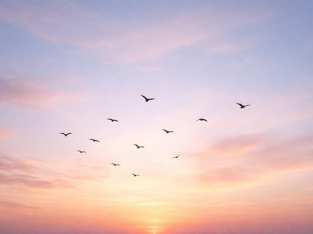 Silhouetted birds flying at dawn against a soft glowing sky, symbolizing a sign from heaven